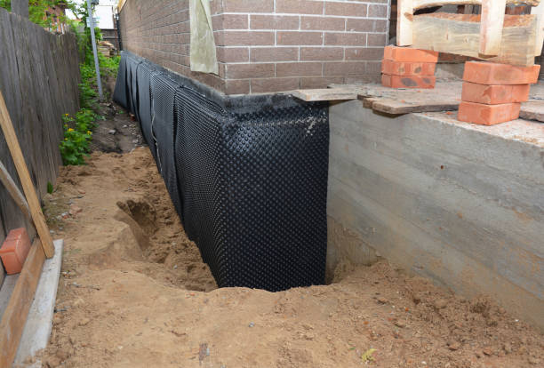 SJ Waterproofing Pros technician performing targeted Emergency Waterproofing assessment in Beach Haven, NJ
